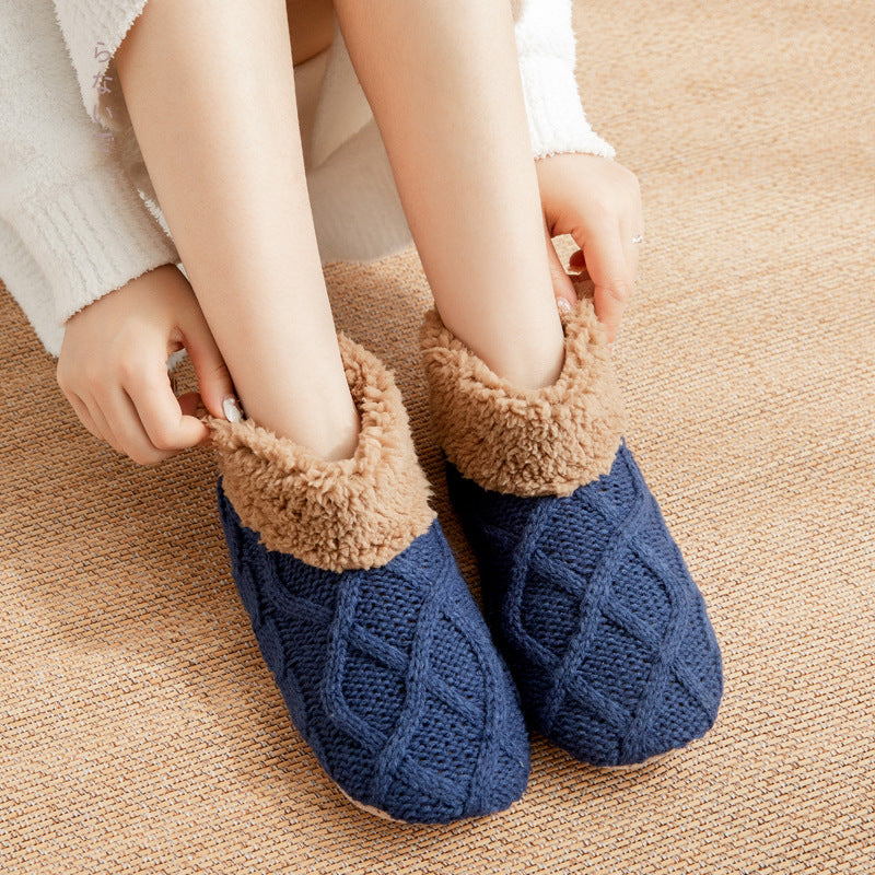 a person wearing blue slippers