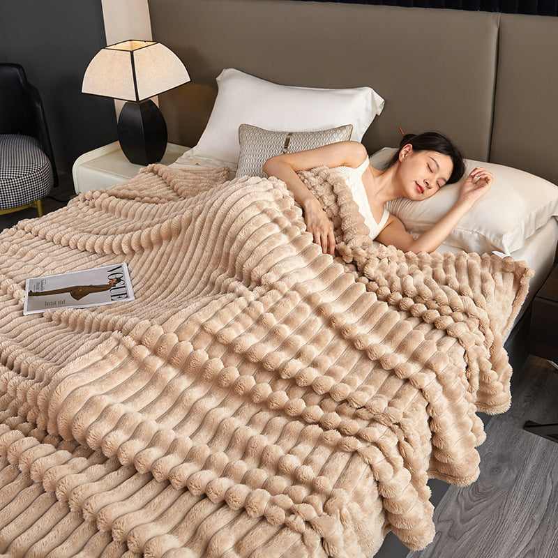 a woman sleeping on a bed
