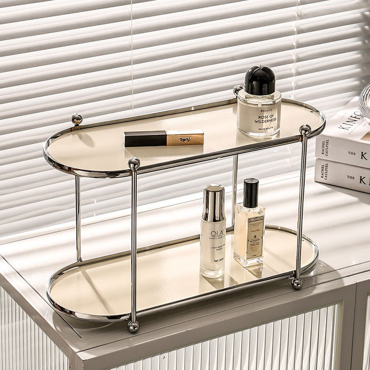 a shelf with a few bottles of cosmetics on it