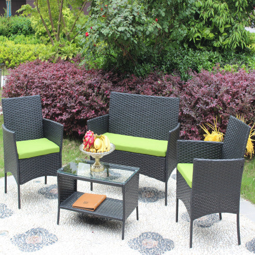 a group of chairs and a table in a garden
