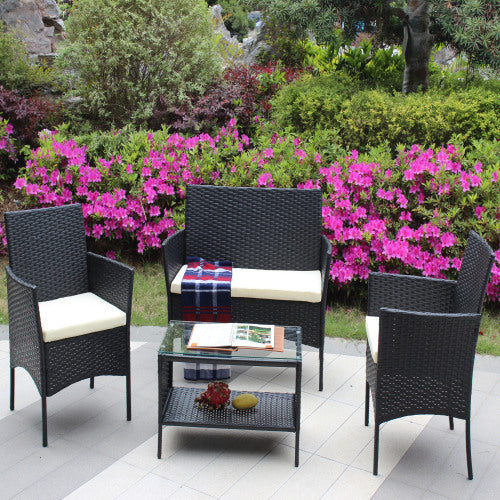a patio with chairs and a table