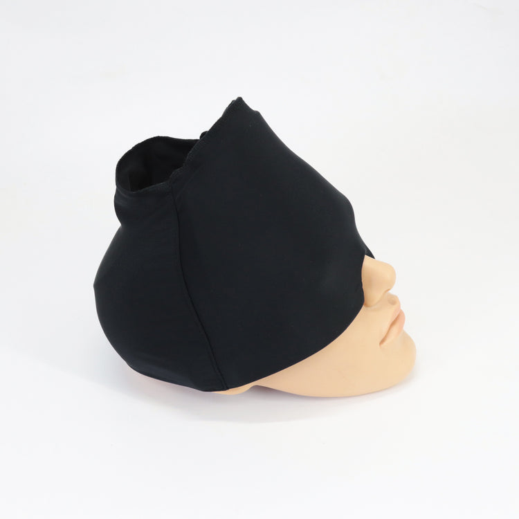 a black mask on a mannequin