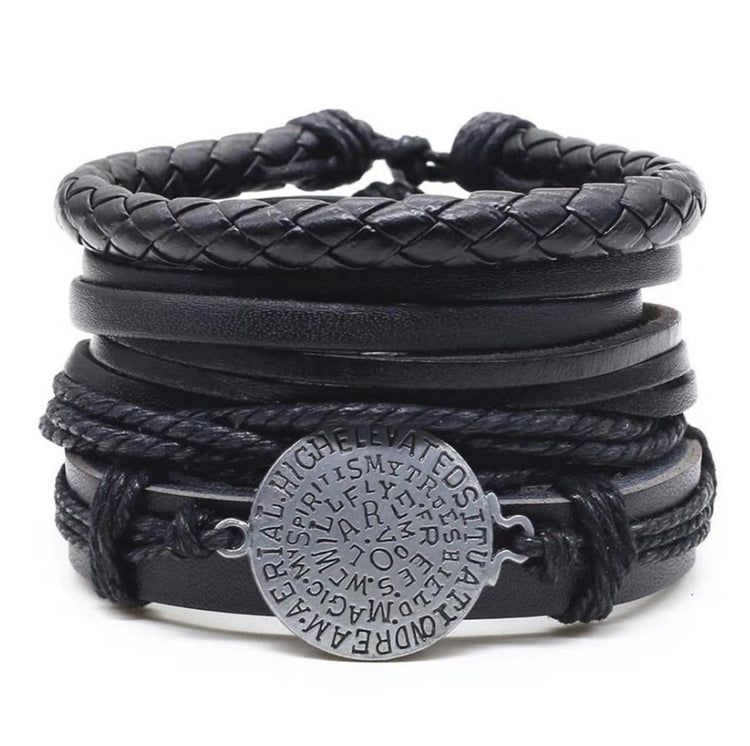 a black leather bracelet with a silver medallion