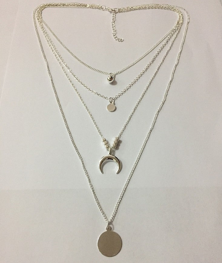 a necklace with multiple chains