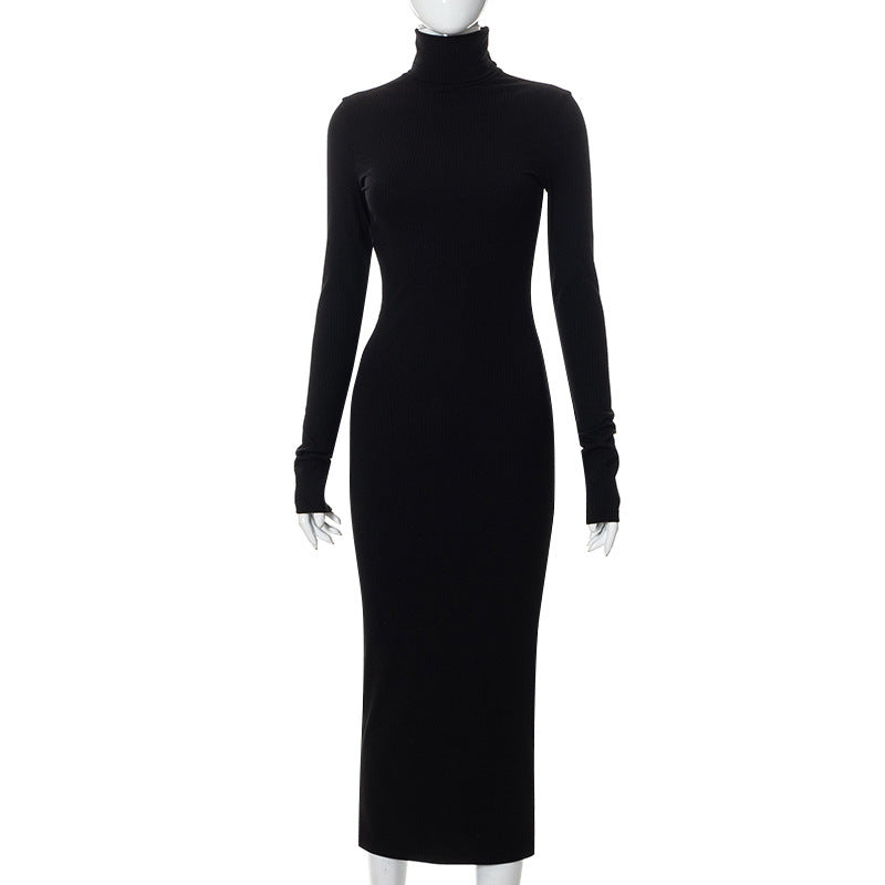 a black dress on a mannequin