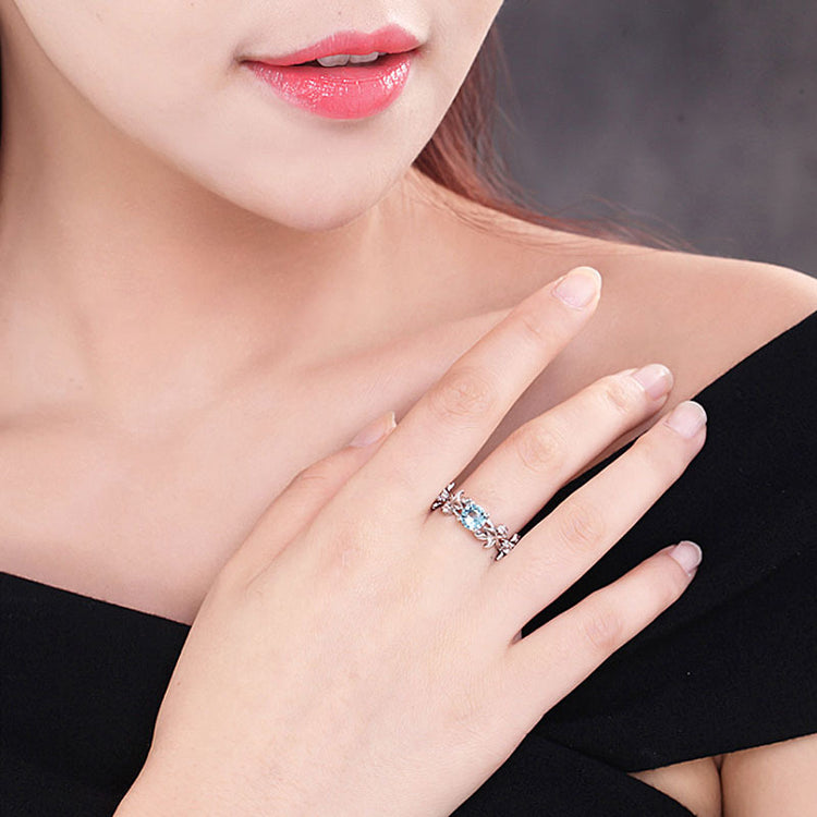 a woman wearing a ring