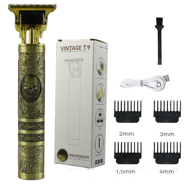 a gold and black electric hair clipper