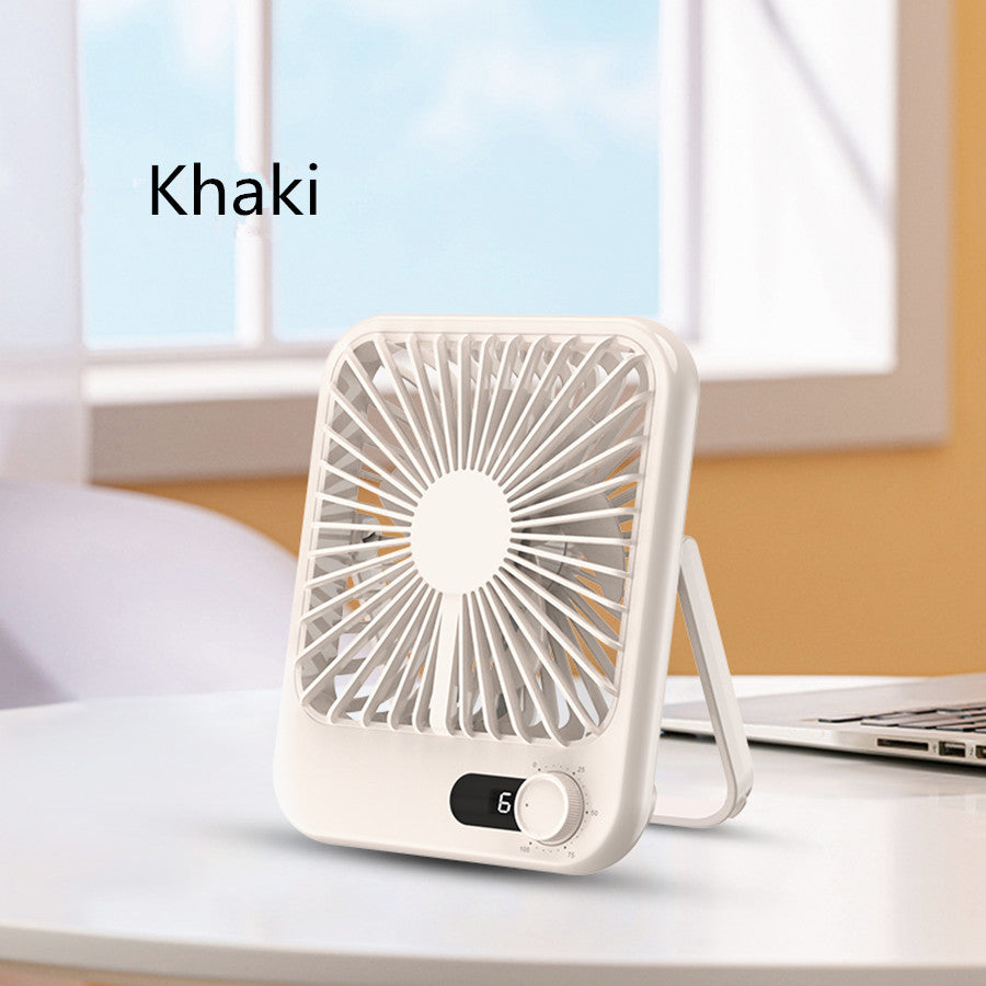 a small white fan on a table