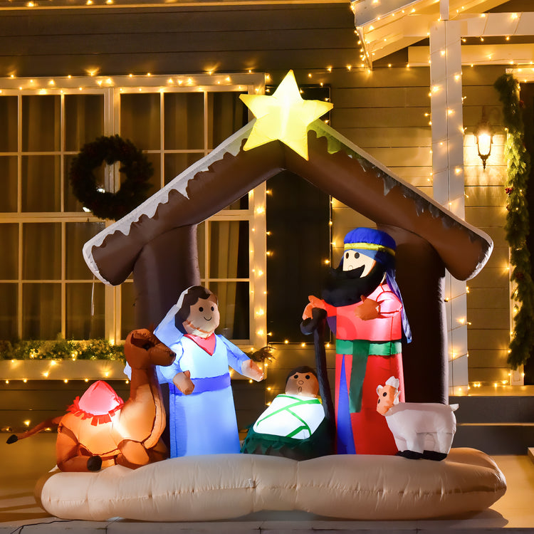 a inflatable nativity scene in front of a house