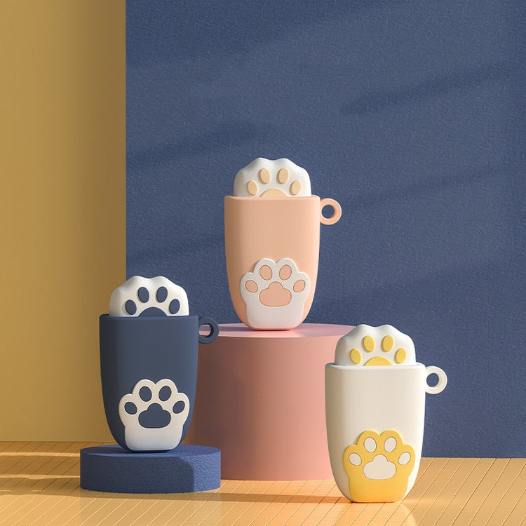 a group of coffee mugs with paw prints