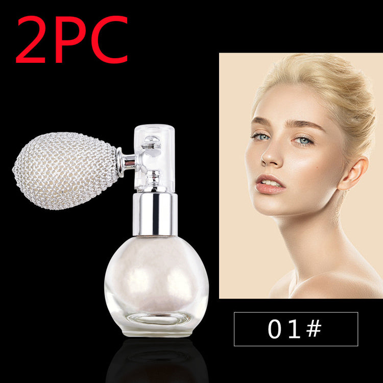 a bottle of perfume with a silver cap