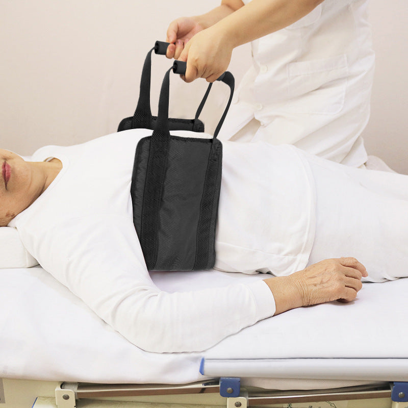 a person holding a sling over a woman's back