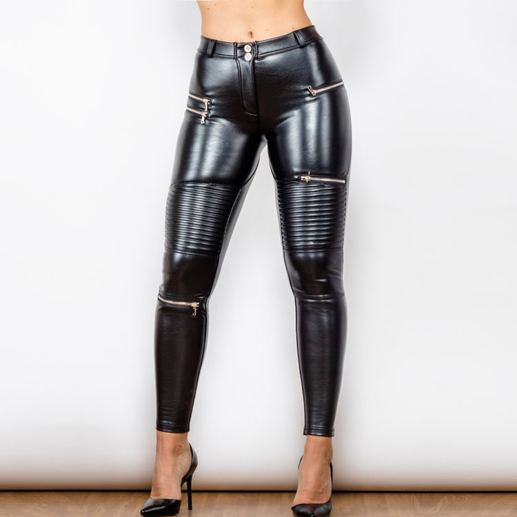 a woman wearing black leather pants