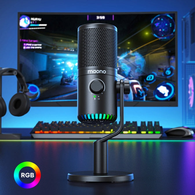 a microphone on a stand in front of a computer monitor