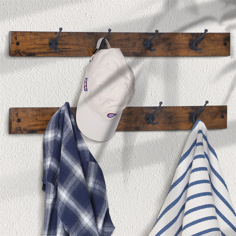 a hat and towel on a wall