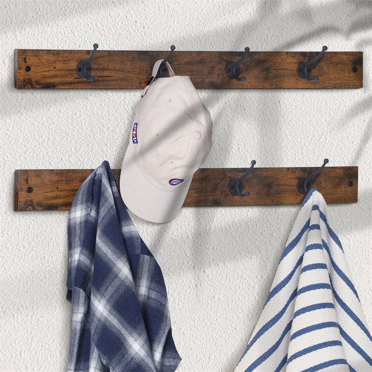 a hat and towel on a wall