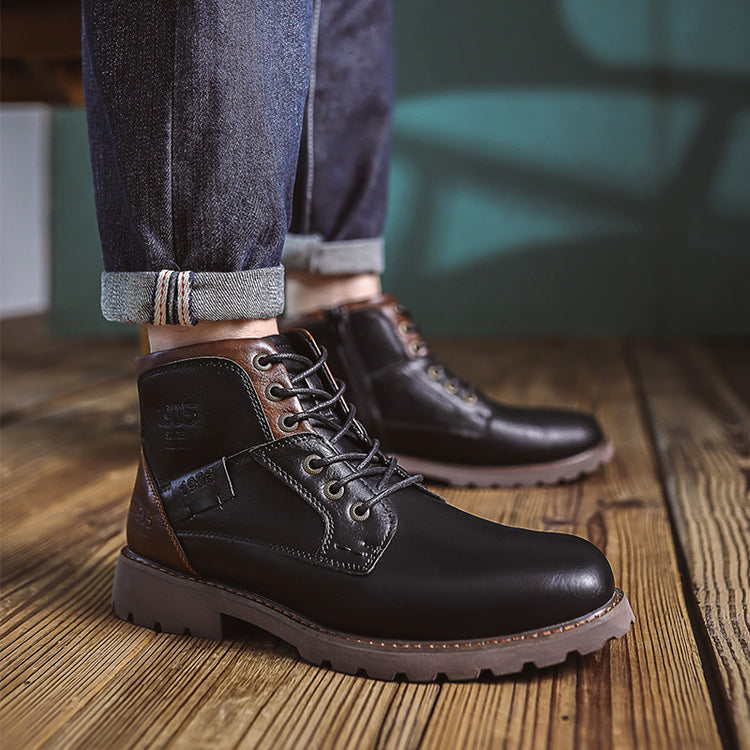 a pair of black leather boots