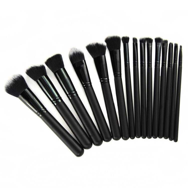 a group of black makeup brushes