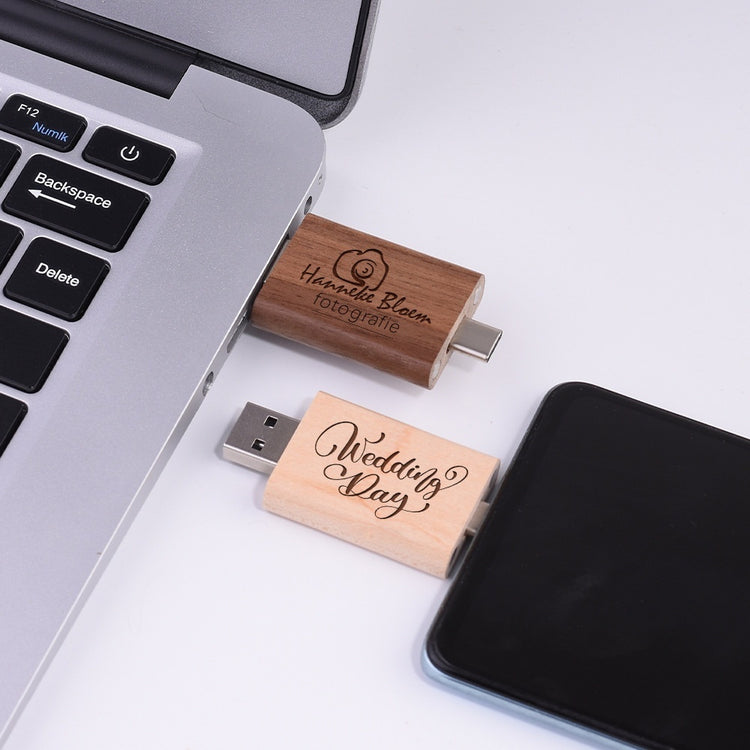 a usb drive next to a laptop