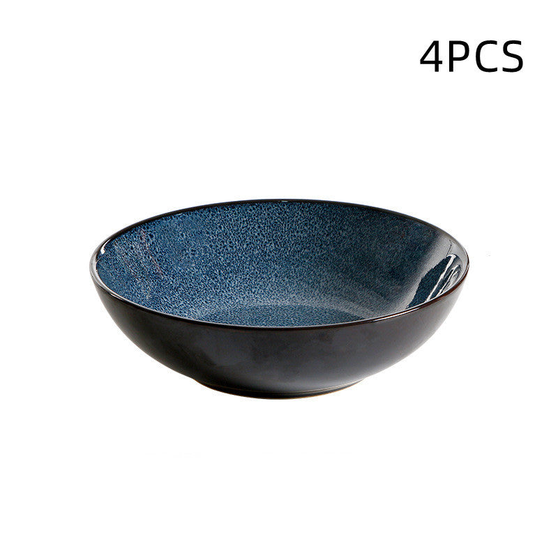 a bowl with a speckled surface