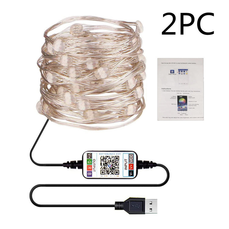 a wire of lights with a qr code and a card