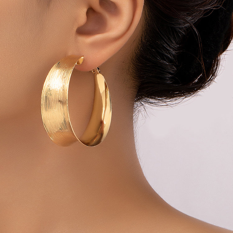 a close up of a woman's ear