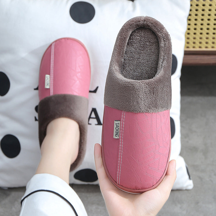a person holding a slipper