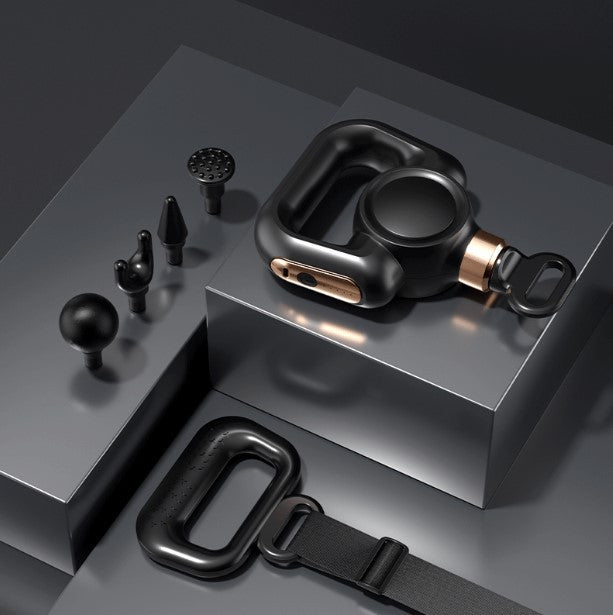 a black and gold object on a black surface