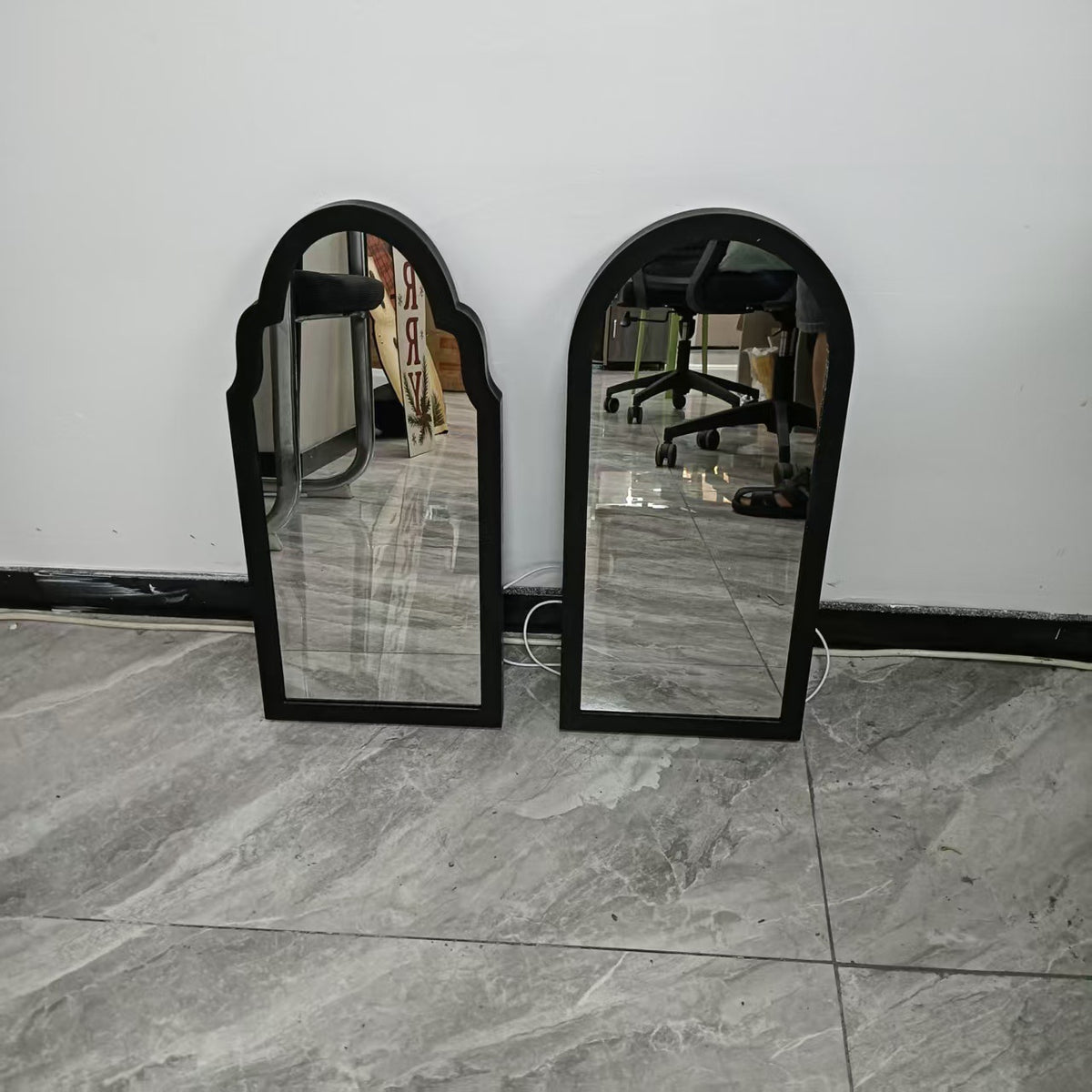 two mirrors on the floor