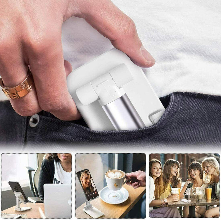 a person's hand holding a device in a pocket