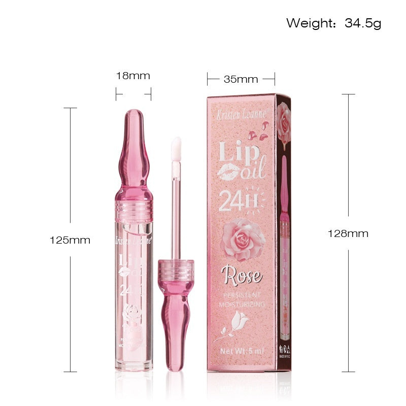 a pink lip oil with a pink box and a pink lip oil
