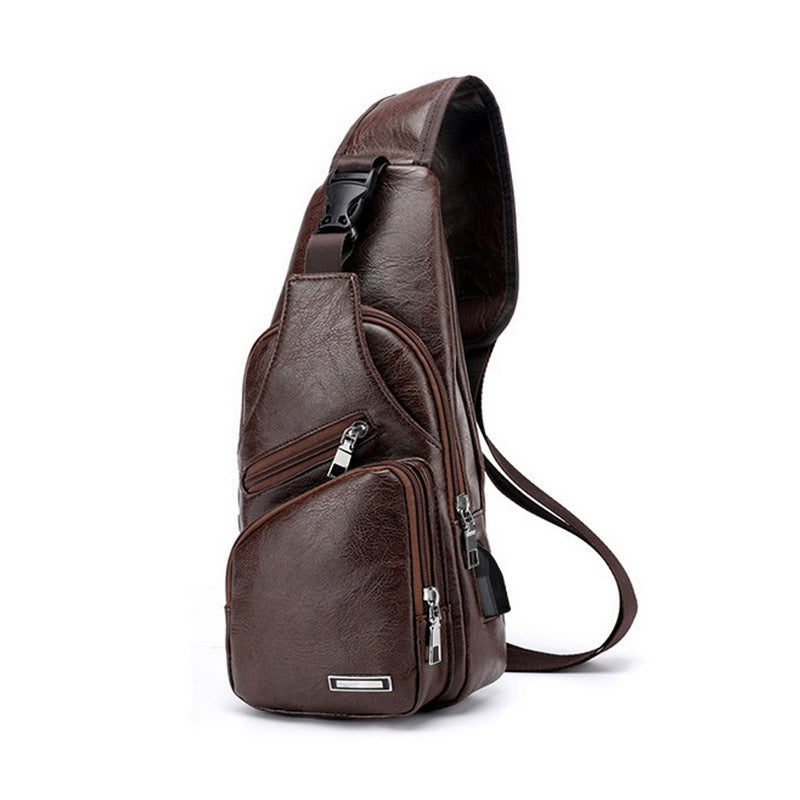 a brown leather backpack with zippers