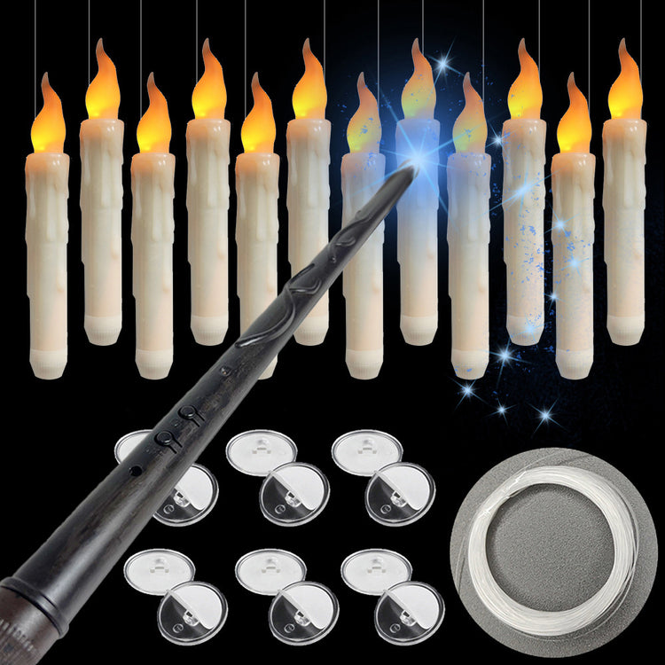 a group of candles with a wand and a circle of buttons