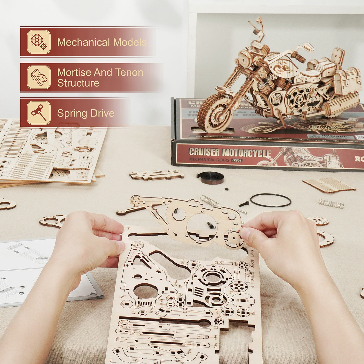 a person's hands making a piece of wood