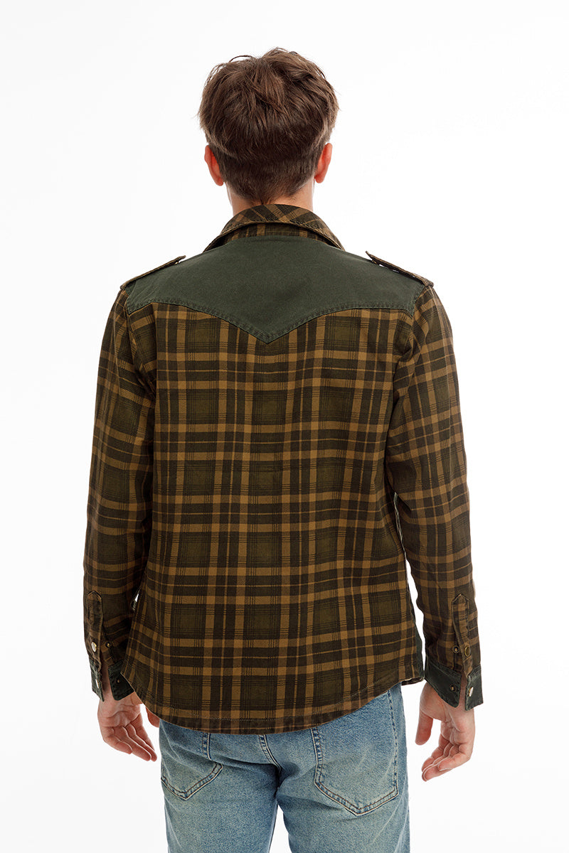 a person wearing a plaid shirt
