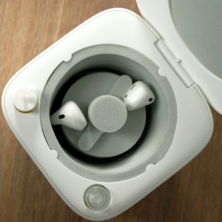 a white box with a white object with a lid open