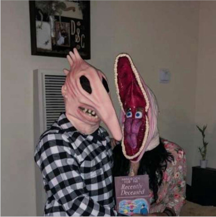 a person in a mask with a mouth open