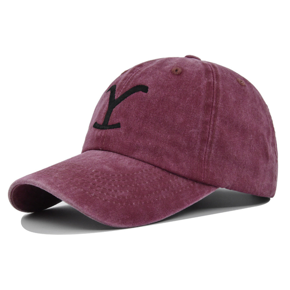 a red hat with a black y on it