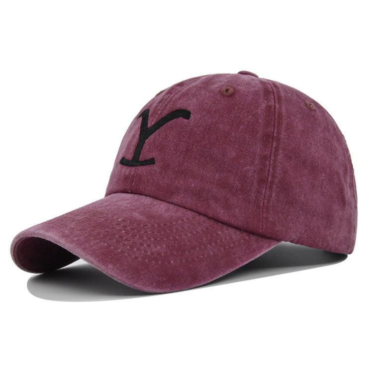 a red hat with a black y on it