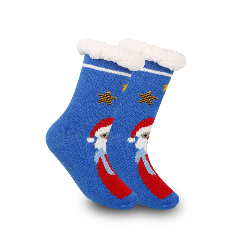 a pair of blue socks with a santa claus and stars