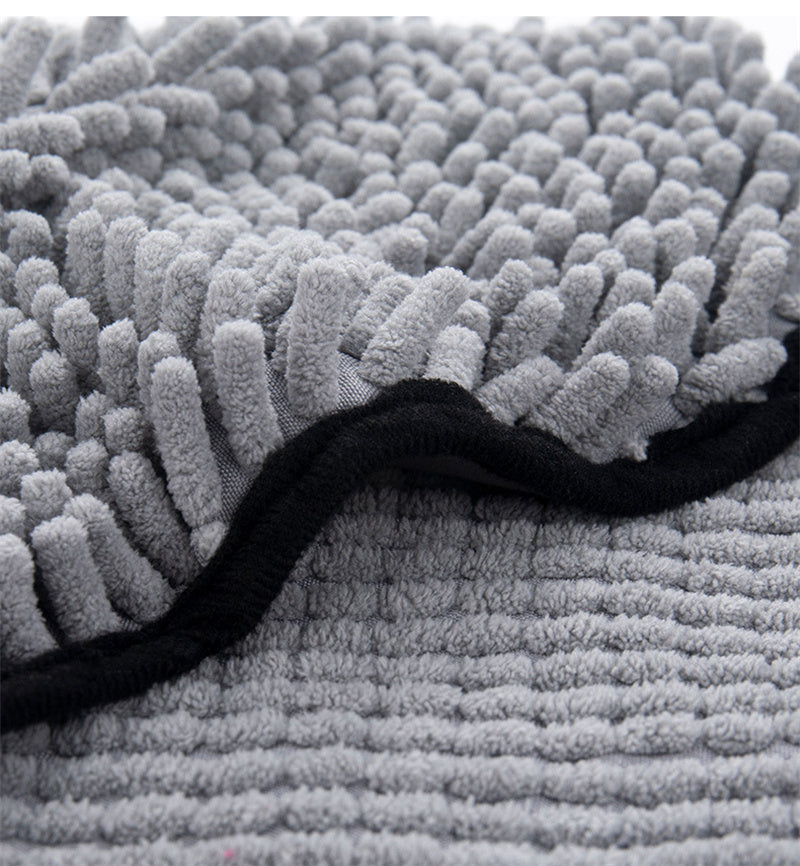 a close up of a grey carpet