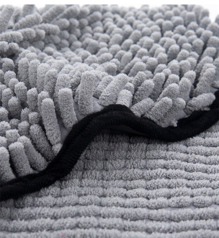 a close up of a grey carpet