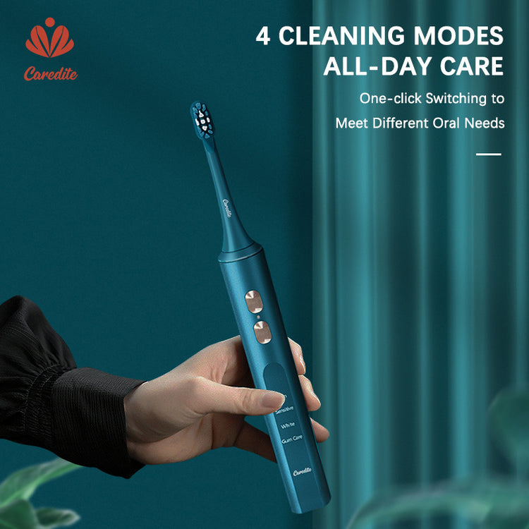 a hand holding a blue toothbrush