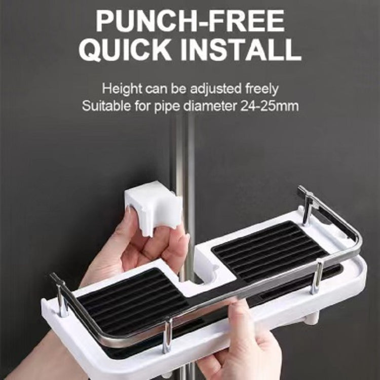 a hand holding a metal holder