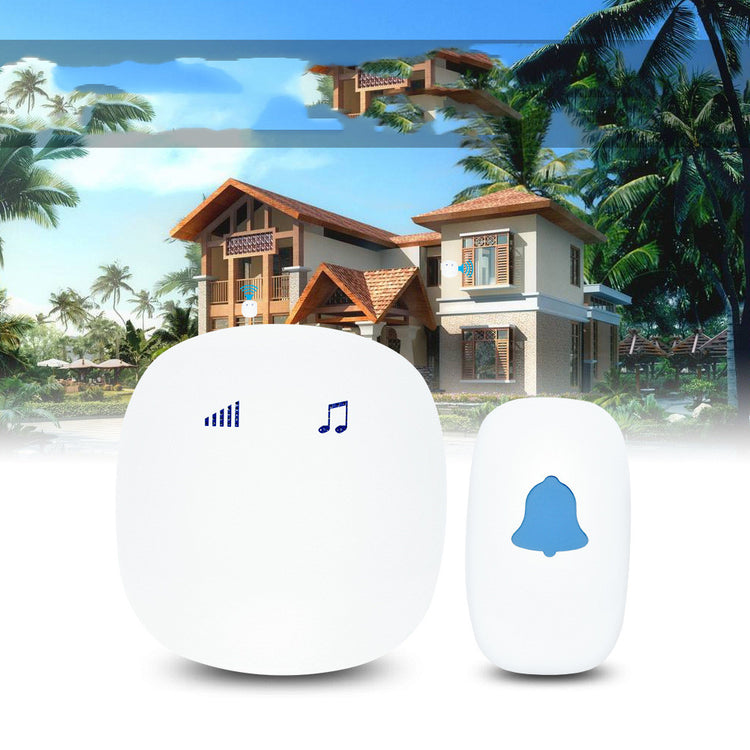 a white device with a bell on it