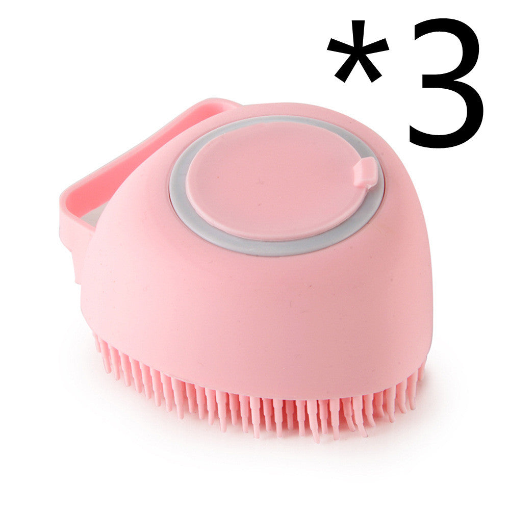 a pink brush with a round handle