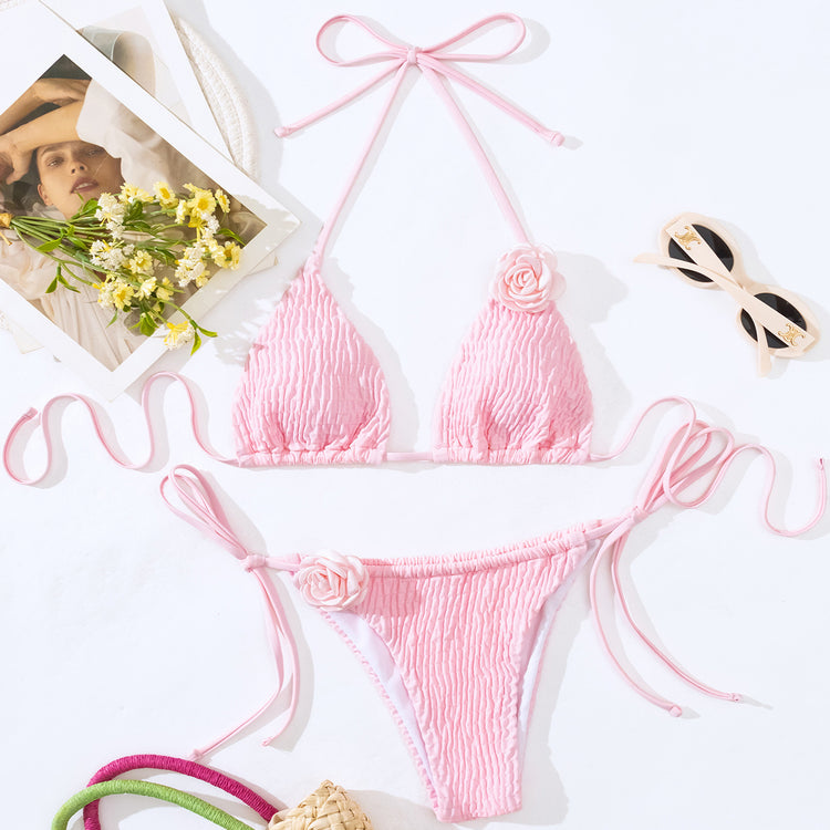 a pink garment and sunglasses