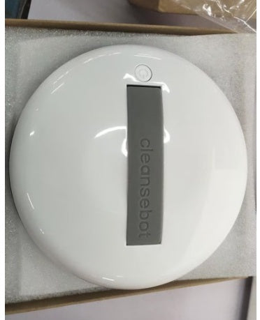 a white circular object in a box