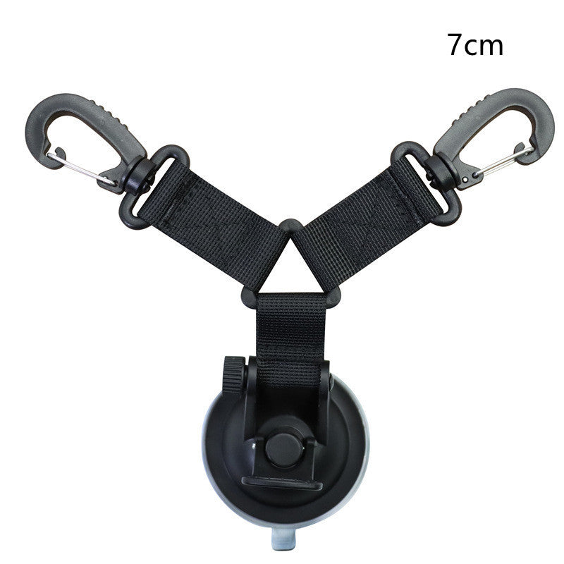 a black strap with a black plastic holder