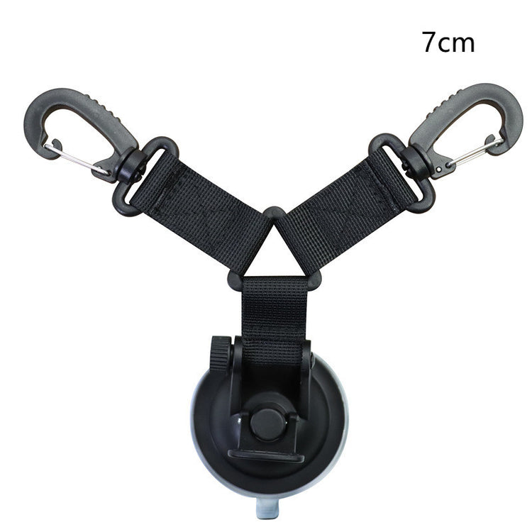 a black strap with a black plastic holder